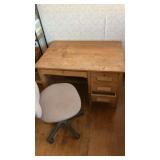 Wooden office desk. With office rolling chair.