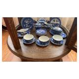 Miniature blue and white porcelain dinnerware.