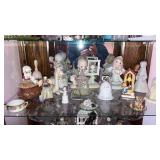 Precious Moments figurines, along with other glass