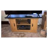 TV stand 42ï¿½ x 23 1/2ï¿½. Does not include TV or