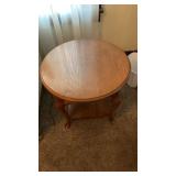 Wooden side table. Approximately 25 inch radius.
