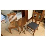 Two wooden chairs with wooden TV tray