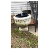 Two concrete plant holders