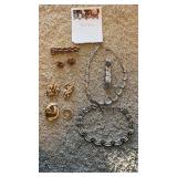 Assortment of jewelry including brackets snap on