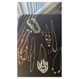 Large lot of costume jewelry, necklaces, and