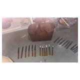 Woven picnic basket with vintage silverware sets