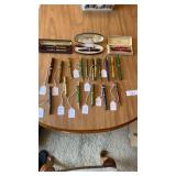 Large collection of writing utensils, including