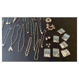 Large lot of silver color necklaces, bracelets,