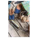 Welding, gloves, tool belt, and grease gun
