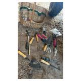 Assortment of garden tools and Wolvenbasket