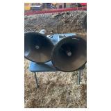 Two large outdoor speakers