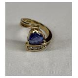 Trillion blue stone ring with six diamonds