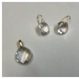 14 karat faceted white transparent pendant and