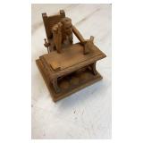 Vintage hand-carved wooden figurine depicting