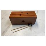 Wooden slit drum or tongue drum with mallets