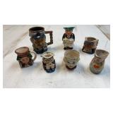 Collection of 7 vintage small Toby character mugs