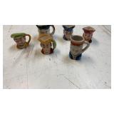 Collection of miniature Toby character mugs (6)