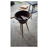 Wooden bowl spoons on three legged spinning stand