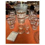 Large lot of gold accent glassware including: