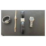Jewelry lot of ladies and menï¿½s watches, pins,