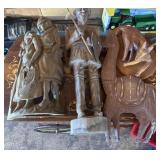 Large wood carved sculptures including giraffe,