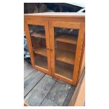 Two custom-made cabinets, oak with glass doors,
