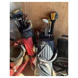 Two sets of golf clubs clubs include tailor-made