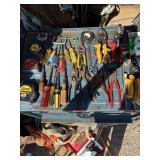Tools including pliers, screwdrivers, tape,