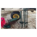 (9) Metal stakes, garden chair, and cooking item