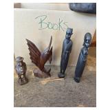 Wood carved sculptures, including fish and people