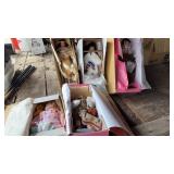 5 dolls in original boxes.