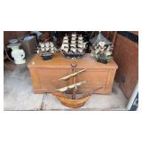 4 wooden toy ships