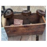 Vintage wood box, hose, sad irons, pulley,