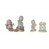 Precious Moments Figurines and Cross Stitched Wall Hangings