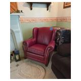 Leather-Like Cushioned Rocking Chair. Burgundy Color Approx 37 in. W x 33 in. D