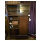 Metal Storage Cabinet 42" x 15 " x 72" . Contents Included. Must Bring Proper Manpower for Removal.