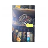 Contents of Left Side of Shelf Including Spray Paint