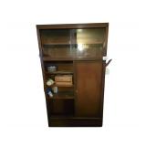 Metal Storage Cabinet 42" x 15 " x 72" . Contents Included. Must Bring Proper Manpower for Removal.