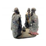 A Piece of Art with Four Men Sharing A Camp Fire 6x6x6 Inches Broken in Two Pieces