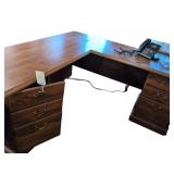 L-Shaped desk 5.5 F x 5.5 F , Verizon Desk Phone, 2 Drawer Filing Cabinet. Paper Trays. Computer Cables. Covered Garbage Can