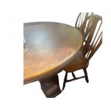 Older Round Wooden Table 59x30 Inches with 4 Chairs