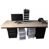 Table, Filing Cabinets, Paper Trays, Computer Monitor.