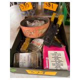 A 9x12.5x3 Inch Metal Tray of Rivets and a Rivet Gun