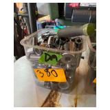 A 7x7x7 InchPlastic Container Full of Sockets of Various Sizes