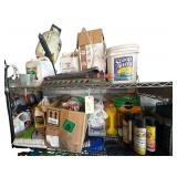 Contents of Top Two Shelves  - Lawn and Garden Product - Lawn Sprinklers  - Sprayers -  Bug Spray - Weed/Grass Product - Etc.
