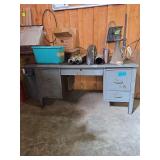 Metal Desk 58" L x 34" D x 31" W. Contents on Top of Desk NOT Included. Must Bring Proper Manpower for Removal