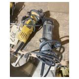 A DeWalt DWE4011 Electric Angle Grinder and a Dremel Multi Max MM30