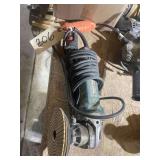 An Electric Makita Angle Grinder with Plenty of Buffing and grinding Pads