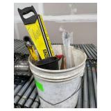 A Bucket with a Hand Saw , Funnel ,Miter Saw