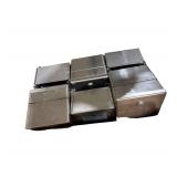 Box of Compact Plus 4-Roll Coreless High- Capacity Toilet Paper Dispenser Black Approximately 10 & Box of 6 Toilet Paper Holders